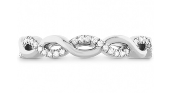 a platinum wedding band featuring twisting strands, one featuring round cut diamonds