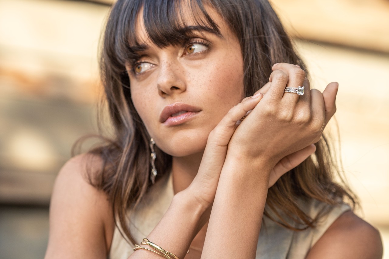 A woman wearing a TACORI engagement ring