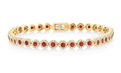 a gold and ruby tennis bracelet from BENARI’s signature collection.