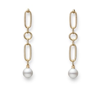 A pair of drop earrings with pearl details from Mikimoto.