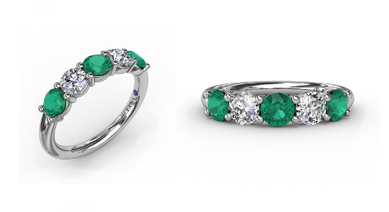 two alternative angles of the same silver and emerald and diamond wedding band.