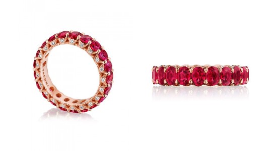 two angles of the same ruby and rose gold wedding band from TACORI.