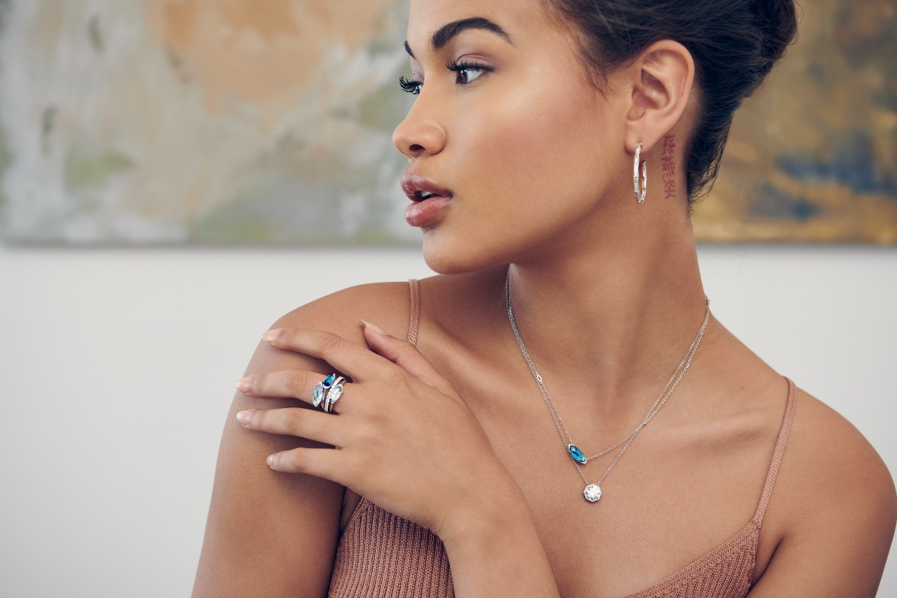 A woman wearing TACORI jewelry for her New Year’s Eve outfit.