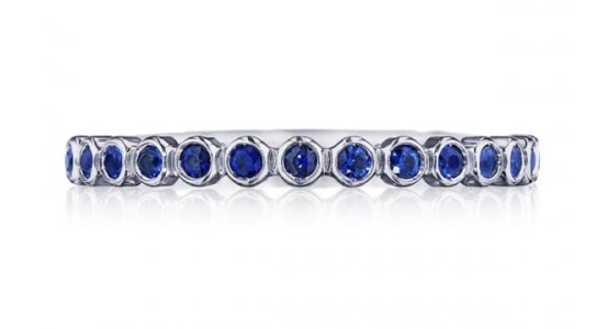 A wedding band from Tacori with bezel-set sapphires.