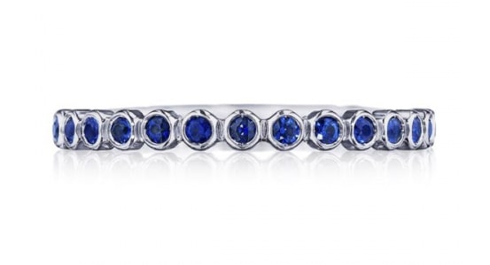 A wedding band from TACORI with bezel-set sapphires.