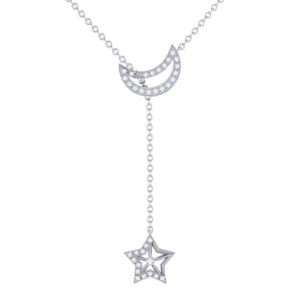 Sterling silver lariat necklace features a moon and star.