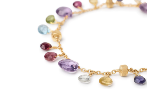 A close-up of a colorful gemstone bracelet from Marco Bicego, available at BENARI JEWELERS.
