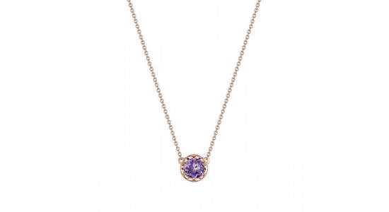 a rose gold pendant necklace with a round cut amethyst