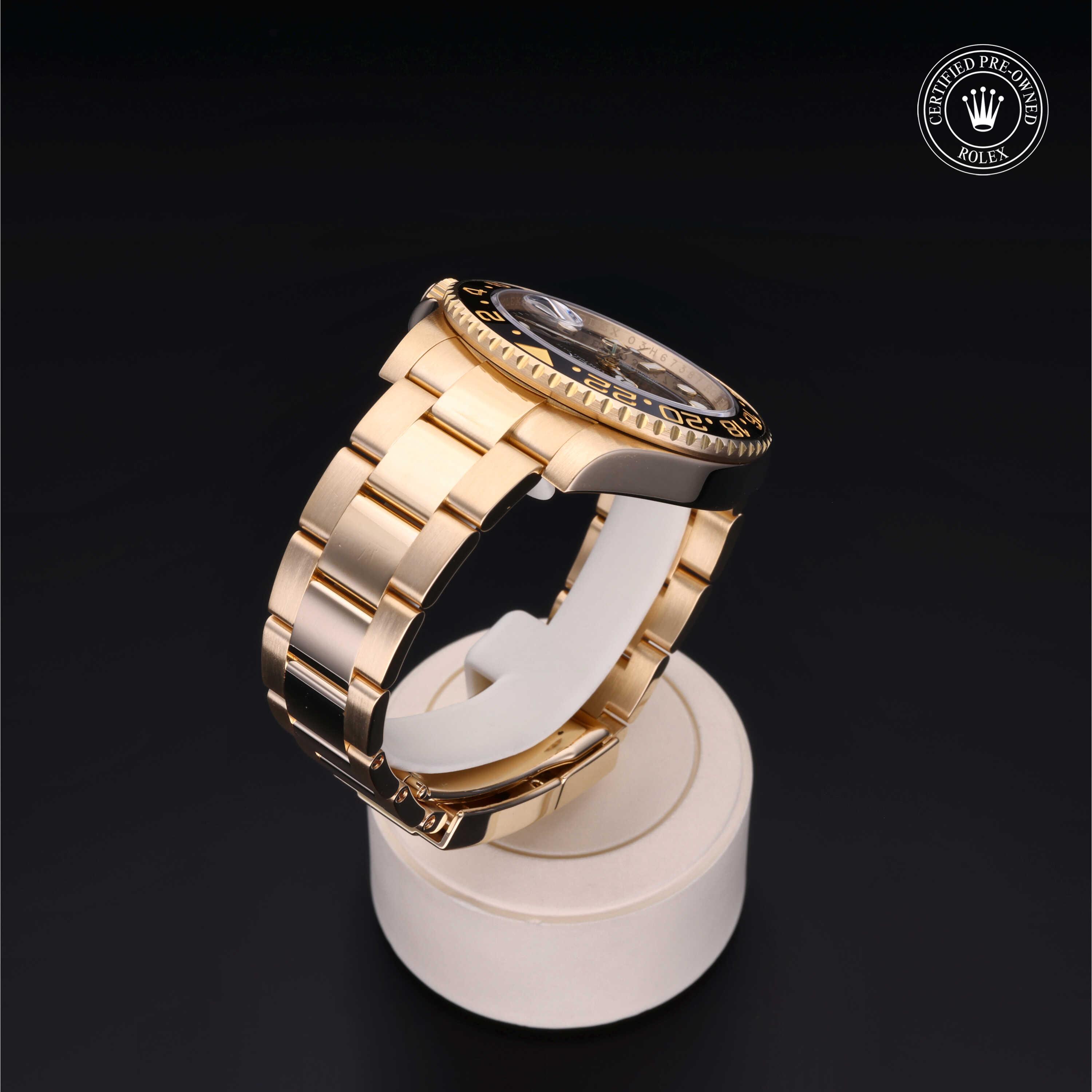 Rolex GMT-Master II in Gold 18 Carat Yellow M116718LN-0001 at Benari Jewelers