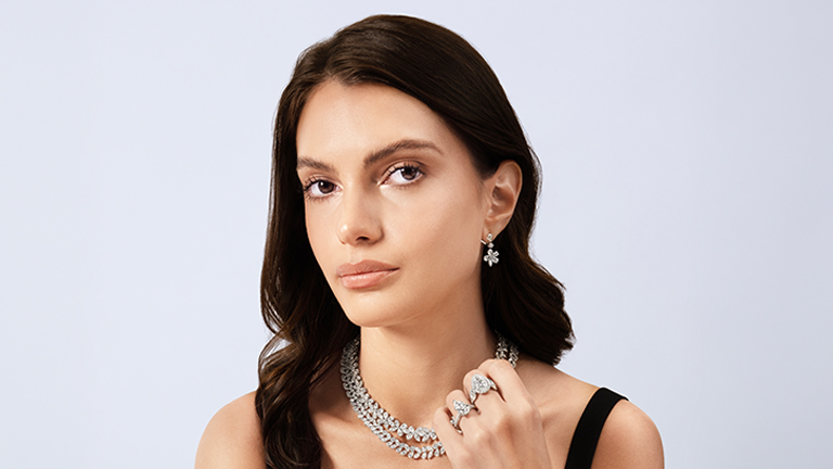 Shop All Uneek - featuring a woman wearing Uneek fine jewelry